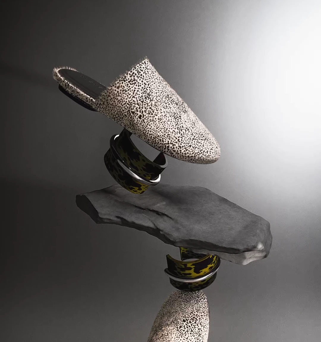 Leopard-print mule, sculptural bracelets and a slate stone balanced in mid-air — 3D marketing campaign for Alcaçuz